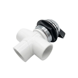An inverted underside view of a small hot tub diverter valve showcasing the white plastic 3 way slip socket plumbing ports and black locking collar nut