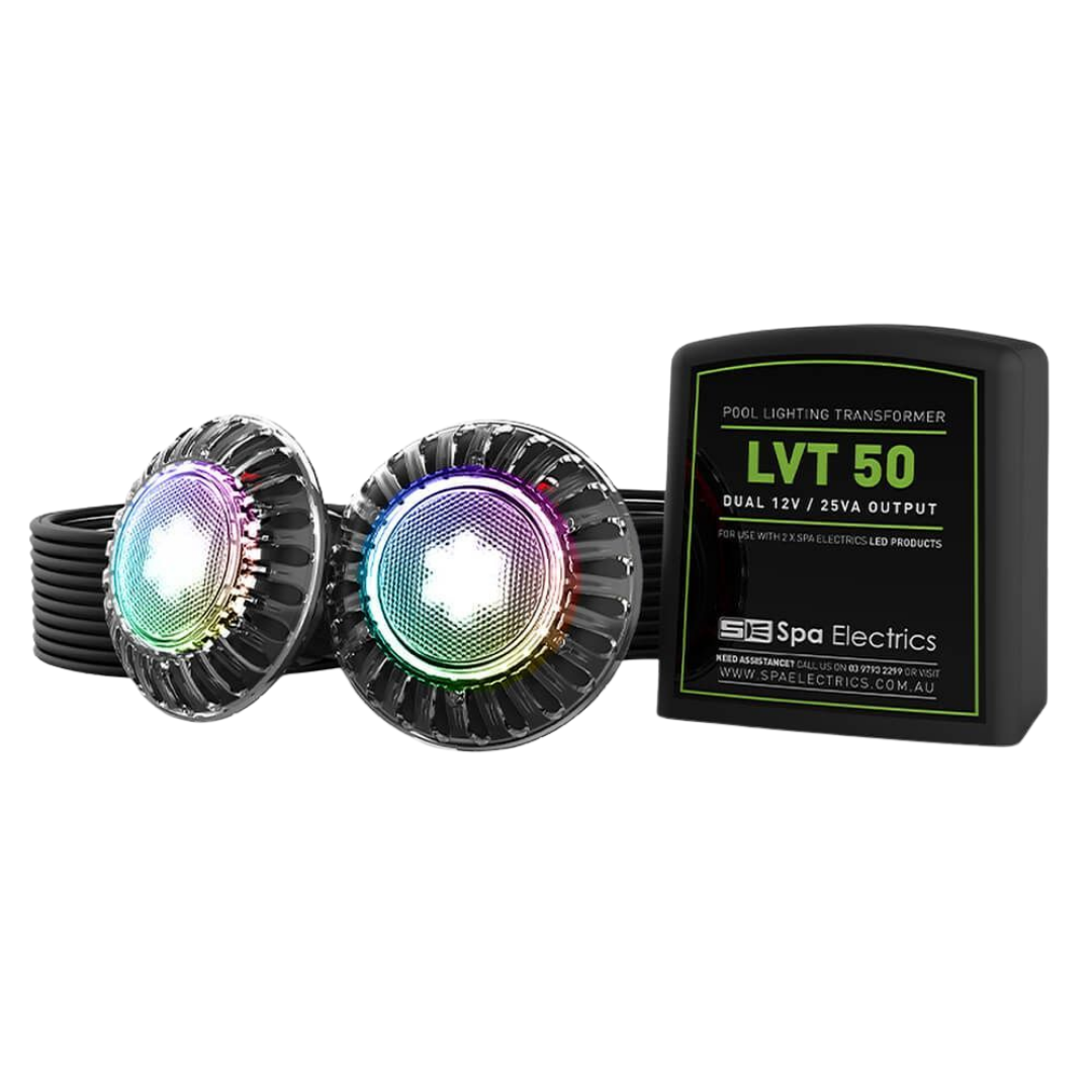Three-quarter angled studio product shot displaying two illuminated Spa Electrics EMF Multi Plus LED pool lights showing multi-color illumination alongside a black Spa Electrics LVT 50 dual 12V 25VA transformer.
