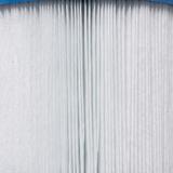 Macro texture close-up of the fine white pleated fabric media on an SQ50 replacement filter element for square basket skimmers