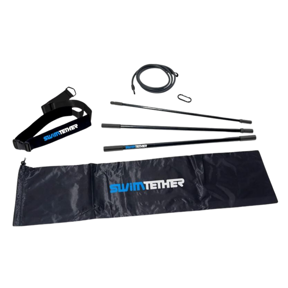 A complete product kit layout for the Swim Tether stationary swimming system isolated on a white background, featuring a black adjustable swim waist belt, a coiled black resistance cord, a carabiner clip, a three-piece sectional pool pole, and a black branded drawstring storage bag.