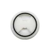 Direct overhead bottom-up view of the base of a replacement swirl spa jet internal insert, showing an off-white circular plastic cap secured with a black rubber O-ring seal.