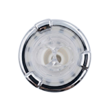 Direct overhead top-down view of a replacement swirl spa jet internal insert, featuring a polished chrome outer rim with three tab accents and a clear plastic face revealing twin directional nozzle openings.