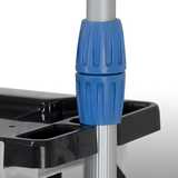 A close-up view of a ribbed blue locking collar on an aluminum telescoping pole resting inside the dedicated vertical storage slot of The Rack pool accessory organizer tray