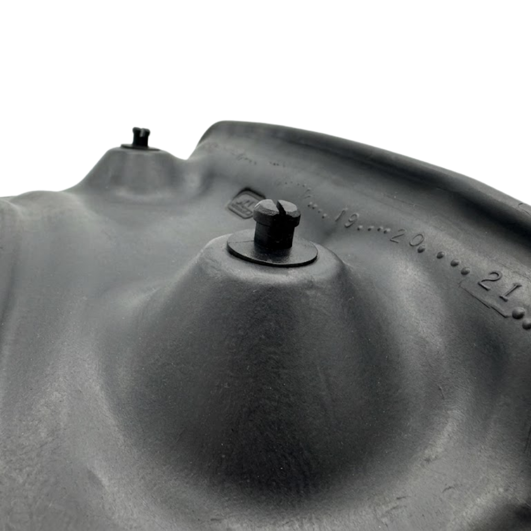 Close-up angled rear view of a Tropic Seas Spas Lounge series replacement hot tub headrest pillow in charcoal gray, focusing on the mounting pegs and back casing design.