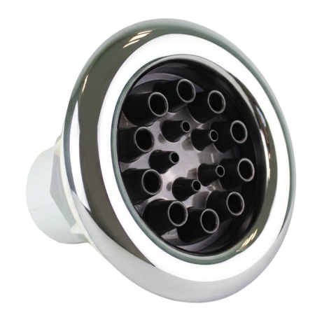 Three-quarter angled studio view of an Ultra Blaster 7 SS Graphite spa jet internal insert, showing a polished stainless steel outer bezel and a dark graphite face plate with multi-nozzle outlets.